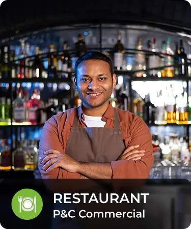 P&C Commercial_LineCarousel_Resto Man in foreground crossing his arms with a smile, in front of a bar. Bottom menu says Restaurant, a P&C Commercial insurance line offered by Olivo.