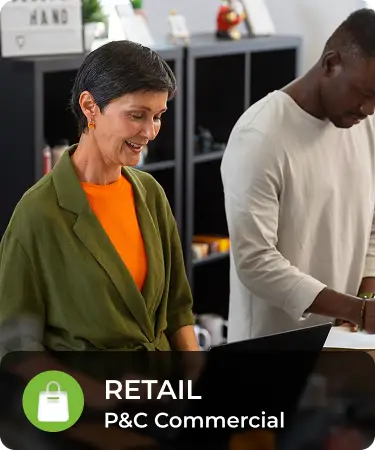 P&C Commercial_LineCarousel_Retail Older woman working at a retail counter. Bottom menu says retail, a P&C Commercial insurance line offered by Olivo.