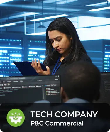 P&C Commercial_LineCarousel_Tech Woman looking at tablet, surrounded by computers. Bottom menu says Tech company, a P&C Commercial insurance line offered by Olivo.